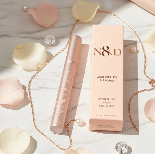 N8KD Lash Vitality Mascara with packaging on a decorative background
